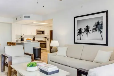 a living room with a couch and a table at Tucker at Palm Trace Landings Fort Lauderdale in Davie