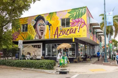 a building with a woman painted on the side of it at Chic 2BR Little Havana Apt with Free Parking in Miami