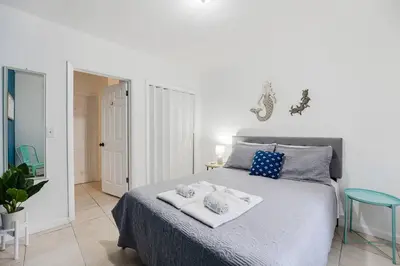 a bedroom with a bed with two towels on it at Bright and Airy Miami 1BR Apt Near Brickell in Miami