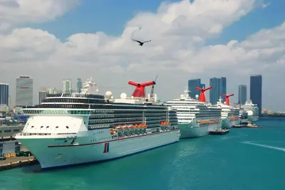 a group of cruise ships docked in a harbor at 1BR Little Havana Apt stepts to Calle 8 in Miami