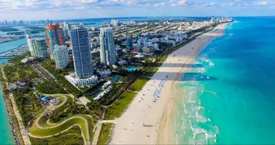 an aerial view of a beach and the ocean at Trendy 2BR Little Havana Apartment in Miami
