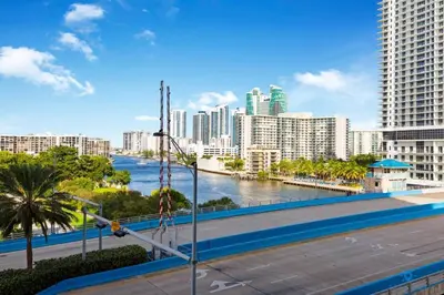a view of a city with a river and buildings at Pool - Gym - Balcony - Amazing View - Near Beach in Hallandale Beach
