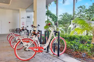 a row of bikes parked in front of a building at Pool - Gym - Balcony - Amazing View - Near Beach in Hallandale Beach