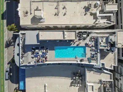 an overhead view of a swimming pool in a city at Rooftop-Pool Suite with King Bed in Ocean Dr C303 in Miami Beach