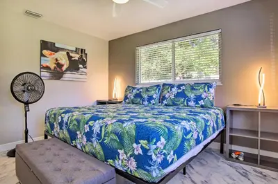 a bedroom with a bed and a window at Wilton Manors Home with Pool about 4 Mi to Beach! in Fort Lauderdale