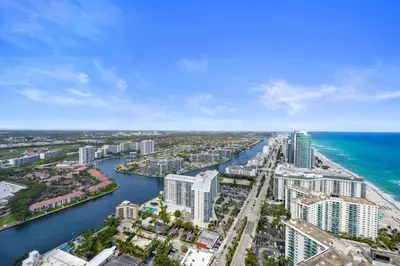an aerial view of a city and the ocean at Beautiful Beachfront Penthouse in Hollywood