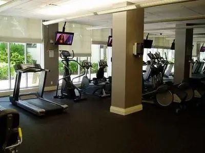 a gym with several exercise bikes in a room at The Tides apartment Go Holiday Home 5th floor in Hollywood