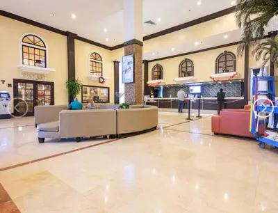 a lobby of a hospital with couches and tables at Lovely beaches ocean & city view in Miami Beach
