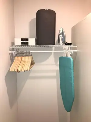 a shelf with a suitcase and a bag on it at The Guesthouse 1 - Wilton Manors in Fort Lauderdale