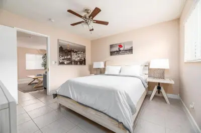 a bedroom with a bed and a ceiling fan at The Retreat 2 - Wilton Manors in Fort Lauderdale