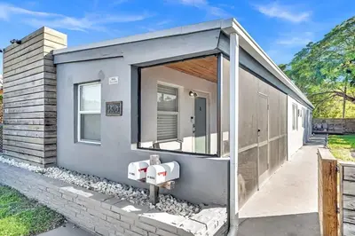 a small house with a door on the side of it at Two Bedroom Hollywood Beach Vacation Sc01 in Hollywood