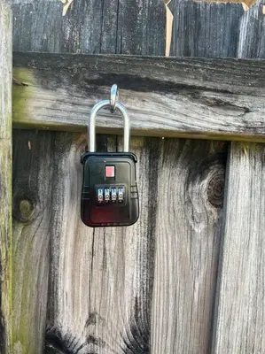 a padlock is hanging on a wooden door at Stunning Deluxe Studio in Hialeah
