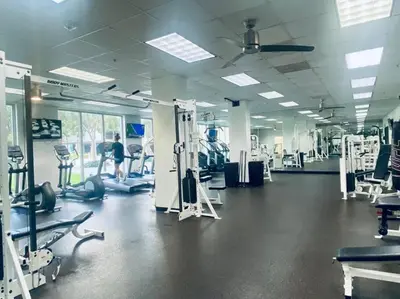 a gym with a man working out in the gym at Ocean Reserve Piso 9 - STR 2412 in Miami Beach