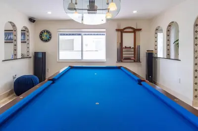 a billiard room with a blue pool table at Oceana Blue / Beach Front / Pool / Bar / Relax in Fort Lauderdale