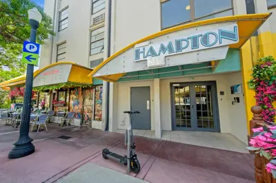 a scooter is parked in front of a restaurant at Cozy studio, walk to the beach, restaurants, bars in Miami Beach