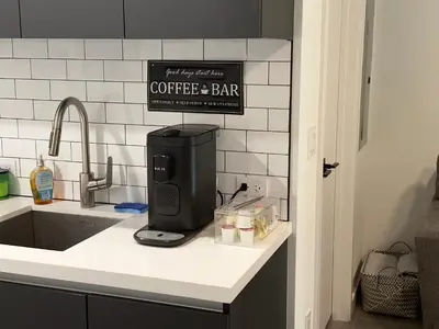 a coffee bar sign on a counter in a kitchen at Exceptional Studio with King Bed and Queen Sofa-bed in Miami