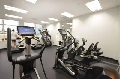 a gym with several treadmills and a treadmill at LUXURY CONDO LOCATED iN THE HEART OF MIAMI in Miami