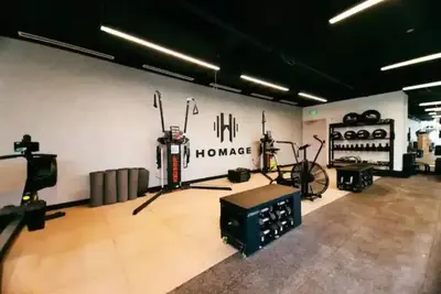 a room with a gym with bikes on the wall at Modern and newly built studio with Pool, Gym, and Restaurant access in Miami