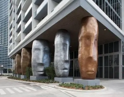 a building with faces on the side of it at Amazing unit Miami Brickell with Sea & City View in Miami