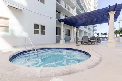 a swimming pool in the middle of a building at Ocean and City Views Lux Miami Brickell Sleeps 5 in Miami