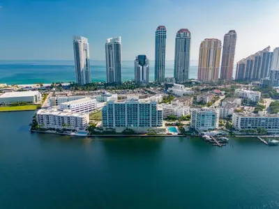 an aerial view of a city with tall buildings at Waterfront Luxury 2-Bedroom Condo Sunny Isles Beach in Miami Beach