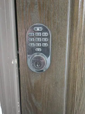 a remote control sitting on the side of a door at Five Bedroom Villa With POOL In Highland Lakes Near Aventura Mall in Miami