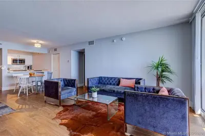 a living room with a couch and a table at 3BR Airbnb Friendly Condo with Ocean View and Balcony in Miami