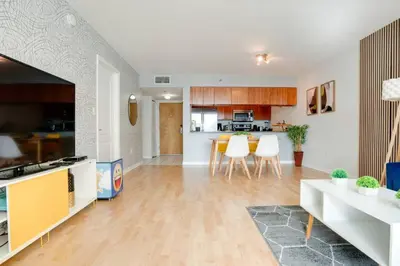 a large room with a kitchen and a living room at Ocean and City Views Lux Miami Brickell Condo Sleeps 4, King Bed in Miami