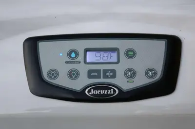 a digital clock sitting on top of a car at Modern Miami Retreat, Hot Tub and Gazebo Oasis in Miami