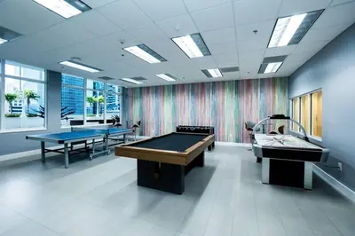 a room with two ping pong tables in it at City views at brickell miami in Miami