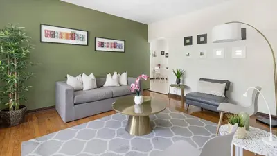 a living room with a couch and a table at Brickell 4ever Apartment Beach 10 minutes Location in Miami