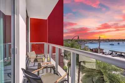 a balcony with chairs and a view of the ocean at Front Bay View Terrace Amazing Pool in Hollywood