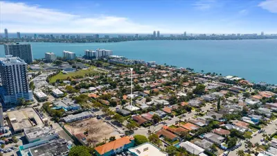 an aerial view of a city next to the water at Luxury House 4 beds heated Pool w Jaccuzzi in North Bay Village