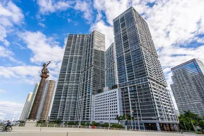 a group of tall skyscrapers in a city at Luxurious Condo at ICON with Views in Miami