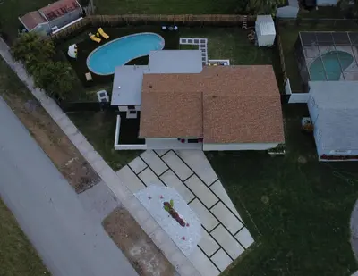an overhead view of a house with a swimming pool at Welcome to 305 Rentals in Miami