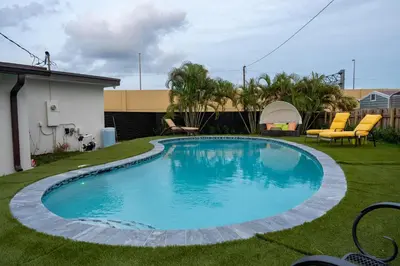 a swimming pool in the middle of a yard at Welcome to 305 Rentals in Miami