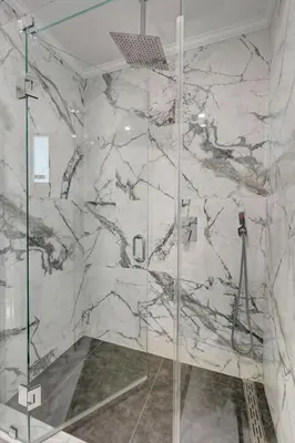 a shower with a glass door in a bathroom at Premium Luxury 5BR Villa near Hollywood Beach in Hollywood