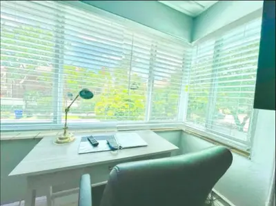 a room with a desk and a chair and a window at Walk to Las Olas Pool Perfect Couples Stay in Fort Lauderdale