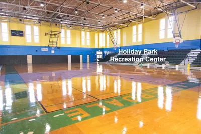 an empty gymnasium with a basketball court at Walk to Las Olas Pool Perfect Couples Stay in Fort Lauderdale