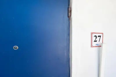 a blue door with the number on it at Spacious Oceanfront Studio with pool access - M27 in Hollywood
