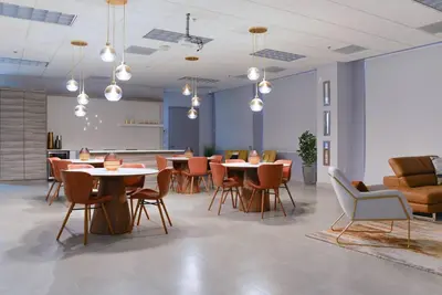 a room with tables and chairs and a kitchen at Centric 40thFloor Brickell Condo FREE parking by Palermo Home Miami in Miami