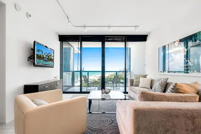 a living room with two couches and a tv at Ocean View Residence at South Beach -1114 in Miami Beach