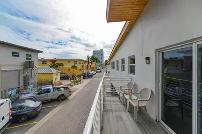 a balcony with a view of a street with cars at Studio with Balcony and Parking - M47 in Hollywood