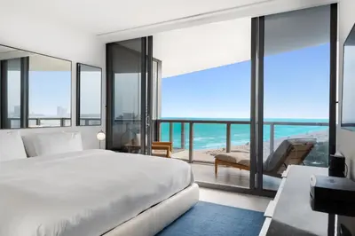a bedroom with a bed and a view of the ocean at OceanView Private Residence at South Beach -1614 in Miami Beach