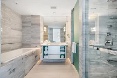 a bathroom with a tub and a sink at OceanView Private Residence at South Beach -1614 in Miami Beach