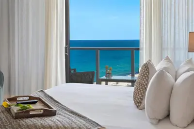 a bedroom with a bed with a view of the ocean at PENTHOUSE Ocean View Residence at South Beach - 1926 in Miami Beach