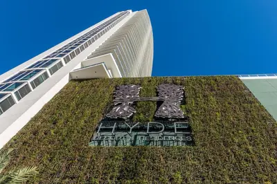 a tall building with a sign on the side of it at Hyde Resort Beachfront Condo #1904 - GORGEOUS 2BD & 2BA APT WITH OCEAN VIEW in Hollywood