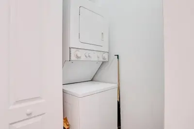 a white washer and dryer in a small kitchen at Best of Brickell's Luxury Suite with Pool and Gym in Miami