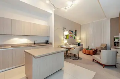 a kitchen and living room with a table and chairs at Amazing apartment - Lyfe Resort & Resident in Hollywood