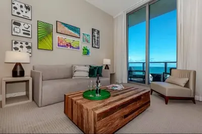 a living room with a couch and a coffee table at Amazing apartment - Lyfe Resort & Resident in Hollywood